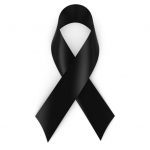 Black Mourning Ribbon isolated on white with shadows